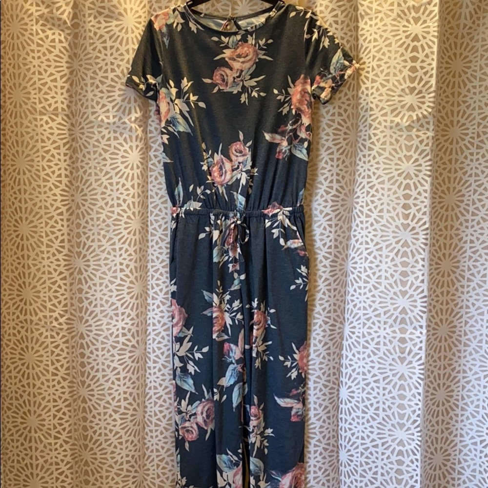 Never worn. Gray Floral Jumpsuit with pockets!
